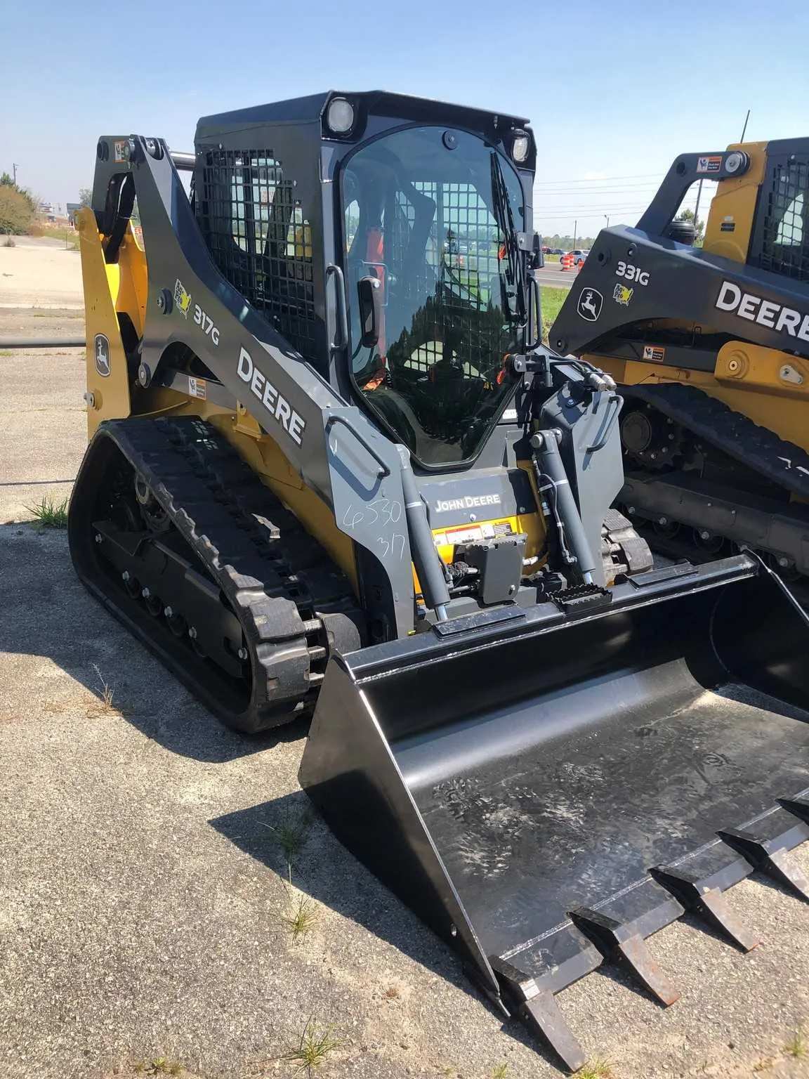 john deere 317 loader specs