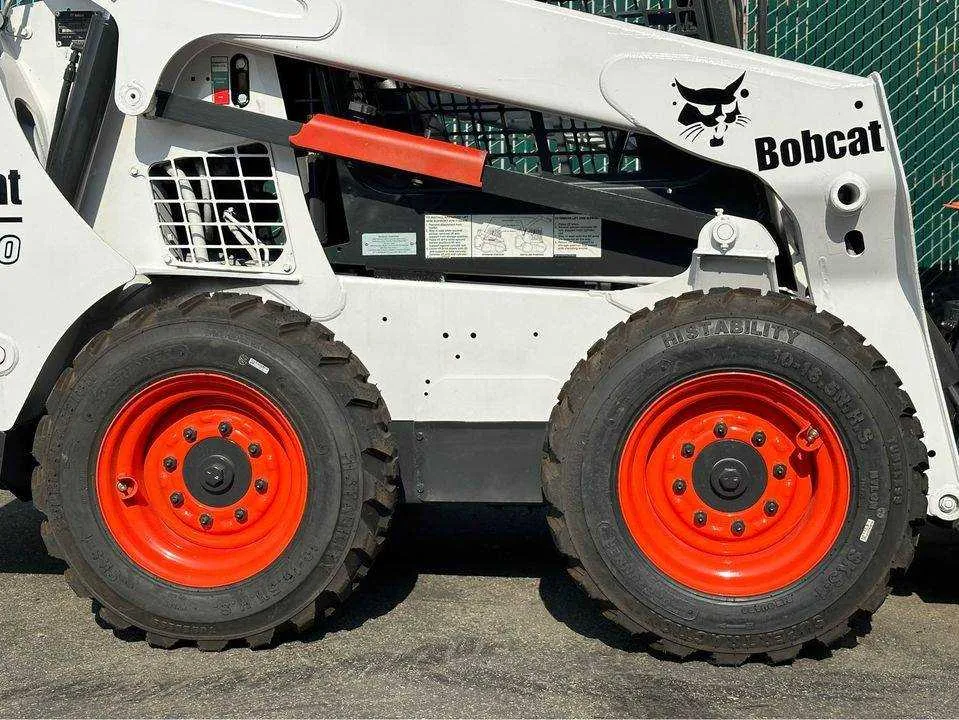 john deere 570 skid steer specs